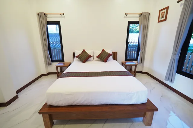 غرفة عائلية بسريرين كوين بإطلالة على الحديقة بشرفة بغرفتي نوم، Chanapah Residence 2/7