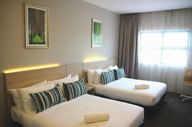 غرفة ديلوكس بسريرين كوين، The Inn Formerly Triple Tree Xpress Hotel 1/4