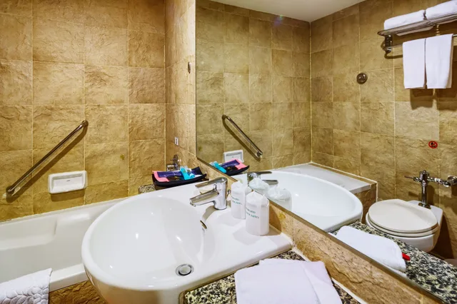 غرفة بريميوم ديلوكس بسرير فردي وسرير كوين، Gold Orchid Bangkok 2/2