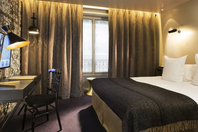غرفة ديلوكس ثلاثية بسرير كوين مع أريكة، Grand Hotel Lafayette Buffault 2/6