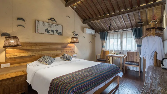 غرفة ديلوكس بسرير كينج، Tongxiang Wuzhen Yuexiang Inn 2/2