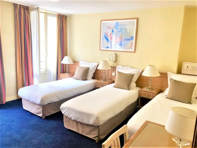 جناح جونيور بسرير كوين مع أريكة، HOTEL DE SUEZ 3/5