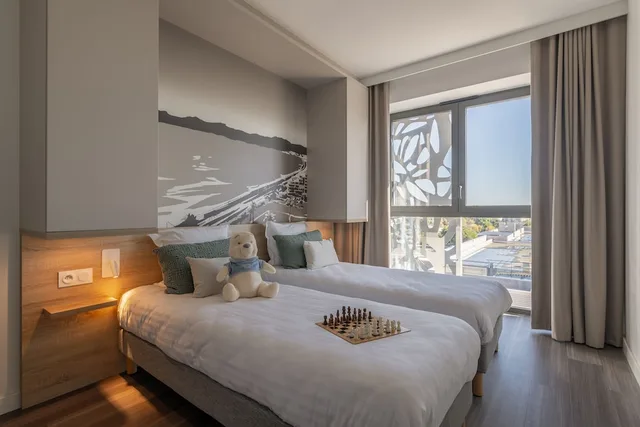 غرفة عائلية بسرير كوين وسريرين منفصلين، Lagrange Apart Hotel - Les Jardins de l Olympie 2/10