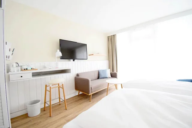 غرفة ديلوكس بسرير كينج بشرفة، Wyn. Strandhotel Sylt 2/5