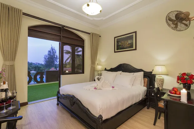 غرفة ديلوكس بسرير كينج، Nesta Hoi An Resort and Spa 6/9
