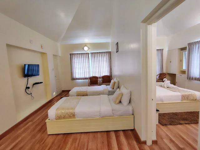 غرفة عائلية بسرير كينج وسريرين منفصلين بغرفة نوم واحدة، Delightz Inn Tiger Hill Resorts 3/10