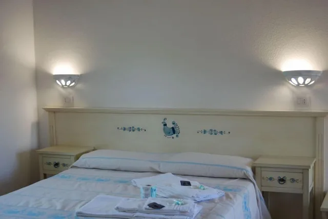 غرفة كلاسيكية بسريرين منفصلين بإطلالة على البحر، Myo Hotel Rocce Sarde 3/5