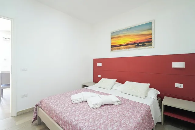 جناح ديلوكس بسرير كوين وسريرين فرديين، Residence La Pineta - Campsite 3/10