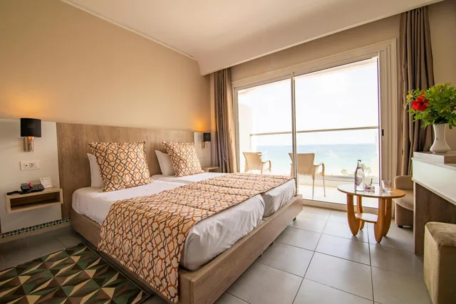 غرفة قياسية مفردة بإطلالة على البحر، Riadh Palms Resort & Spa 2/2