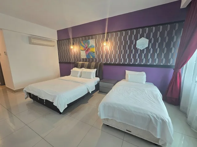 غرفة عائلية بسرير كوين وسرير فردي، Aster Hotel Bukit Jalil 2/3