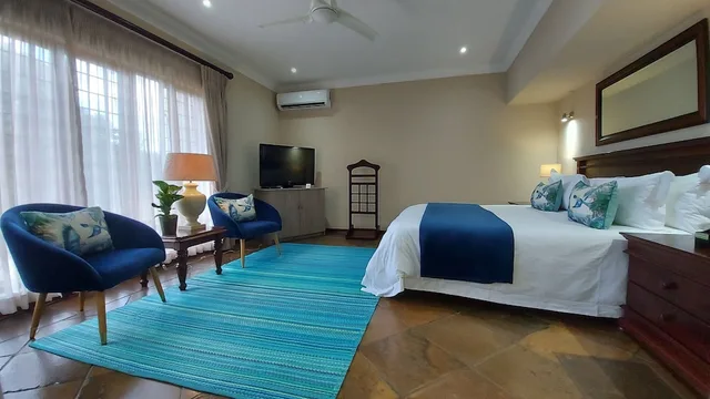 غرفة تنفيذية بسرير كينج بإطلالة على الحديقة، Matumi Golf Lodge 1/3