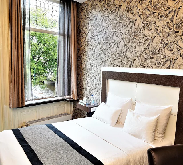 غرفة ديلوكس بسرير مزدوج أو سريرين منفصلين بإطلالة على البحر، Hotel The Bird 1/2