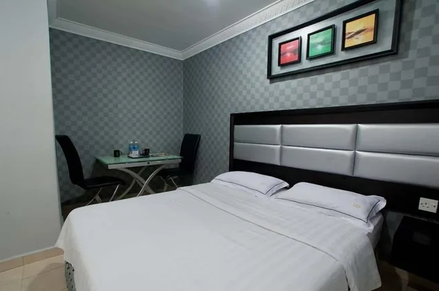 غرفة بريميير ديلوكس عائلية بسرير كوين وسريرين منفصلين، T Hotel 1/2