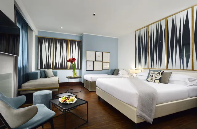 غرفة جونيور رباعية بسرير كوين وسريرين منفصلين، Pulitzer Hotel Rome 1/1