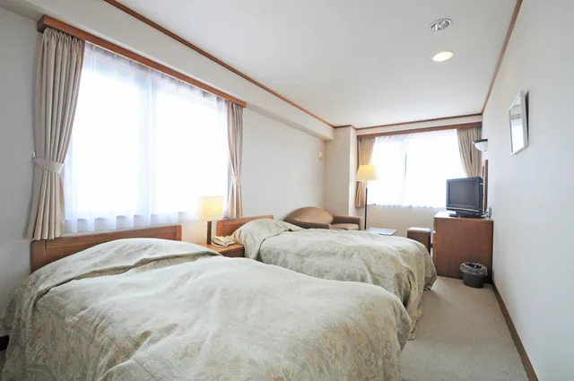 غرفة بسريرين منفصلين بحمام خاص، Niseko Park Hotel 1/1