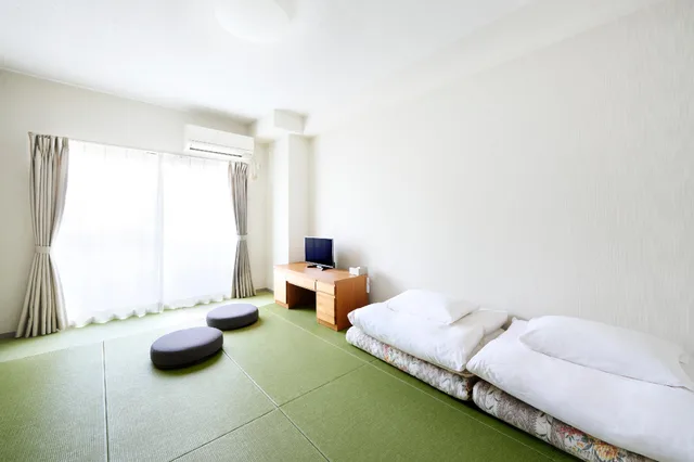 غرفة يابانية بفرشتي فوتون، Montan Hakata Hostel 1/2