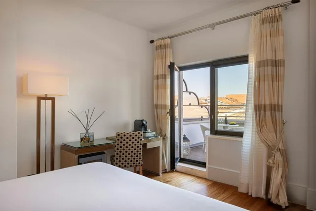 Suite, Double Bed, Sofa, UNAHOTELS Deco Roma 7/10
