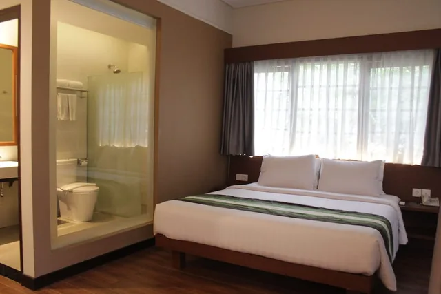 غرفة ديلوكس بسرير كينج، Grand Whiz Hotel Nusa Dua 3/8