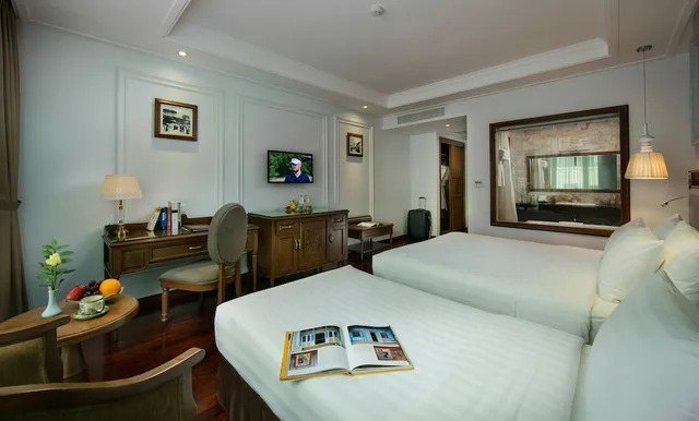 غرفة ديلوكس ثلاثية بسرير كوين وسرير فردي بإطلالة على المدينة، Hanoi Pearl Hotel 6/10