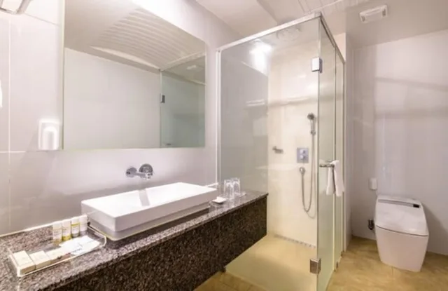 جناح عائلي بسرير مزدوج وسريرين منفصلين، UNI HOTEL JEJU 2/3
