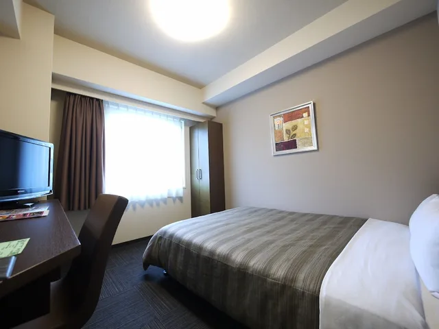 غرفة بسرير نصف مزدوج للمدخنين، Hotel Route-Inn Satsuma Sendai 1/5