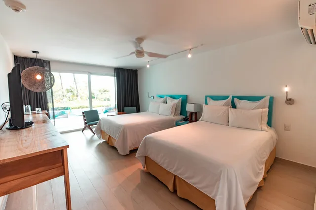جناح عائلي بسريرين مزدوجين وسريرين كينج بـ3 غرف نوم بمسبح خاص، Fiesta Americana Cozumel All inclusive 1/3