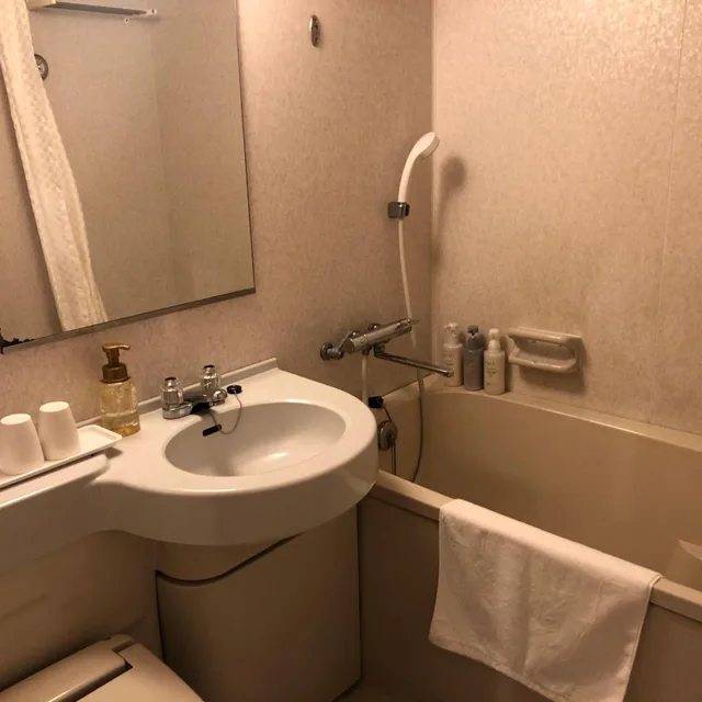 غرفة بسريرين منفصلين بإطلالة على البحر للمدخنين، Naha Beach Side Hotel 9/10