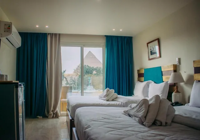 Room, Double or Twin Bed, Pyramids View, Balcony، Great Pyramid Inn 2/4