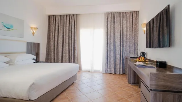 غرفة ديلوكس بسرير مزدوج أو سريرين منفصلين بإطلالة على الحديقة، Pickalbatros Portofino Villaggio Resort 1/6