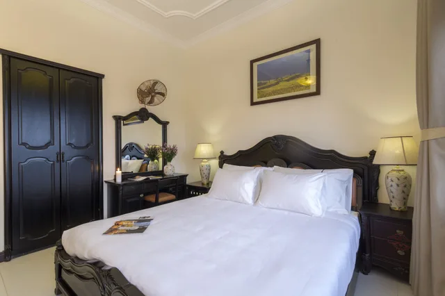 غرفة غراند بسرير كينج بإطلالة على المسبح بشرفة، Nesta Hoi An Resort and Spa 5/9
