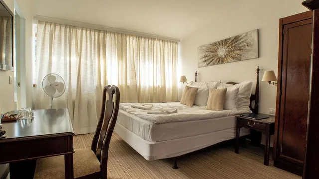 Economy, Queen Bed, No Elevator، OPERA16 Guestrooms 1/3