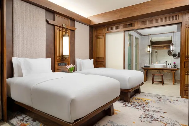 جناح جونيور بسريرين منفصلين، INTERCONTINENTAL LIJIANG ANCIENT TOWN RESORT 2/5