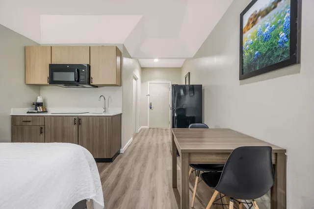 Room, 2 Queen Beds, Kitchenette, SureStay Studio by Best Western Conroe Downtown 8/9