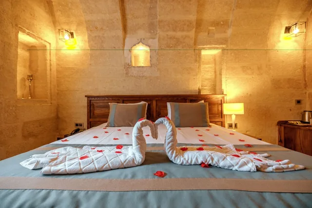 جناح جونيور بسرير كوين مع أريكة، Misty Cave Hotel 1/1