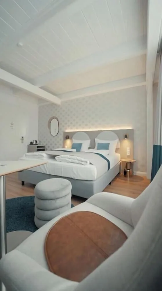 غرفة كلاسيكية ثلاثية بسرير كينج وسرير فردي، Hotel Barbarossa Classic 6/9