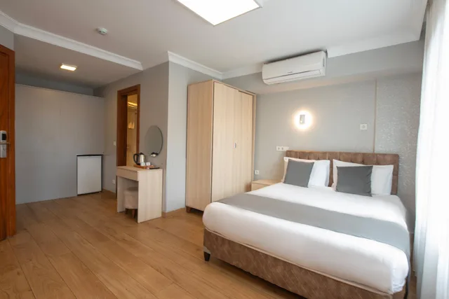 استوديو عائلي بسرير كينج وسريرين منفصلين في الملحق، Sur Hotel 1/2