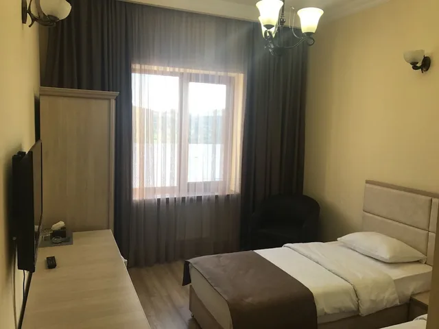 غرفة قياسية بسرير مزدوج أو سريرين منفصلين، Capital Hotel 1/4