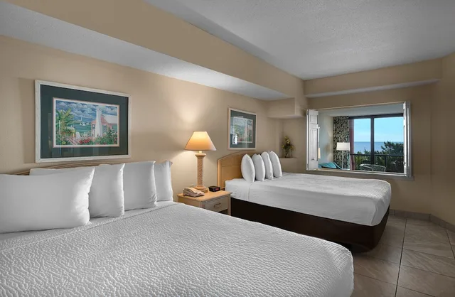 Suite, 2 Queen Beds, Ocean Front, Sofa، Beach Colony Resort 1/8