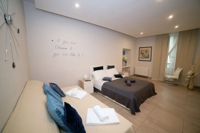 Design, Triple, 1 Queen and 1 Single Bed، B&amp;B Lamezia Terme 1/4