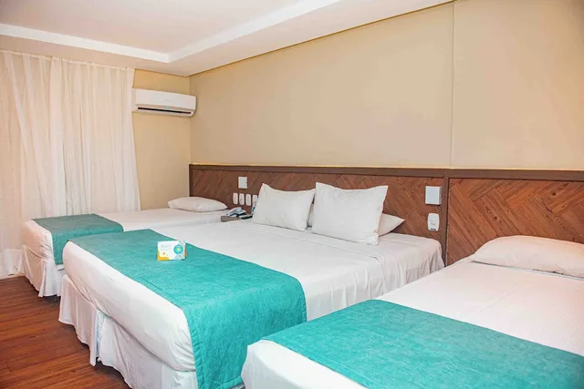 غرفة ديلوكس رباعية بسرير مزدوج وسريرين منفصلين، OPABA PRAIA HOTEL 4/10