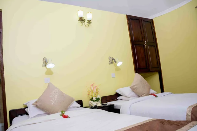 غرفة تقليدية بسرير كينج وسرير فردي، Keys Hotel 1/10