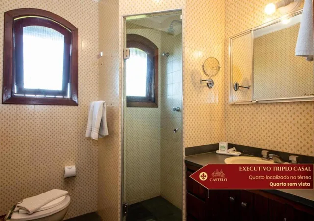 غرفة تنفيذية ثلاثية بسرير مزدوج وسرير فردي، Castelo Nacional Inn Campos Do Jordao 1/1