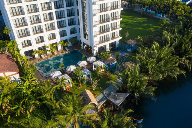 غرفة بريميوم بسرير مزدوج أو سريرين منفصلين، Shining Riverside Hoi An Boutique and Spa 1/2