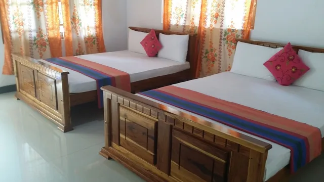 غرفة ديلوكس رباعية بسريرين كوين بإطلالة على الحديقة للمدخنين، Rich Resort & Restaurant 1/4