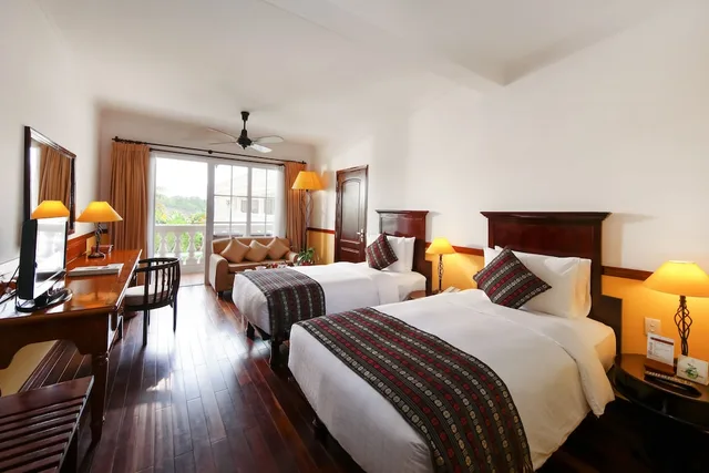 غرفة ديلوكس بسريرين منفصلين بإطلالة على المسبح، Victoria Can Tho Resort 1/2