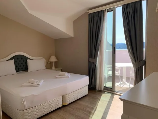 غرفة اقتصادية بسرير كوين مع أريكة، Daphne Residence 1/10