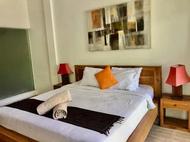 غرفة ديلوكس بسرير كينج بإطلالة على المسبح، D'uma Residence 1/5