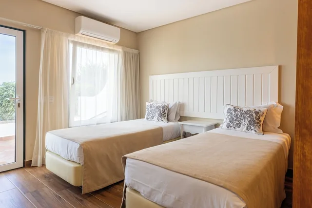 غرفة عائلية بسرير مزدوج وسريرين منفصلين، Hotel Rural Quinta do Marco 4/9