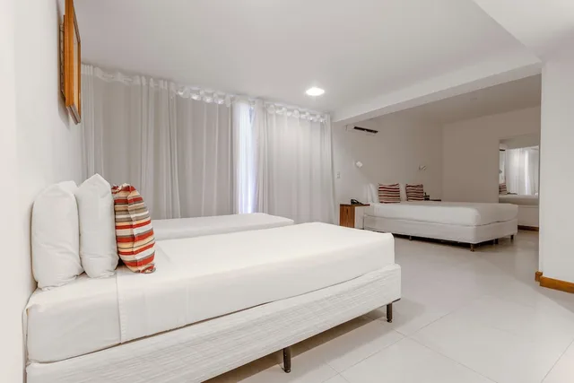 غرفة رباعية بسرير مزدوج وسريرين منفصلين، Ilha Branca Exclusive Hotel 4/10