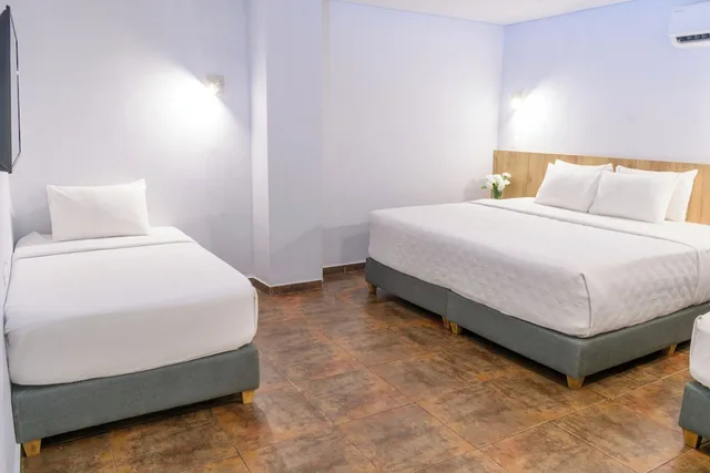 غرفة قياسية رباعية بسريرين مزدوجين، Hotel Caribbean Cartagena 4/10
